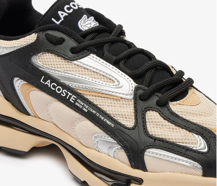 Men's Lacoste L003 2K24 124 1 SMA (Light Tan/Black) running during sunset