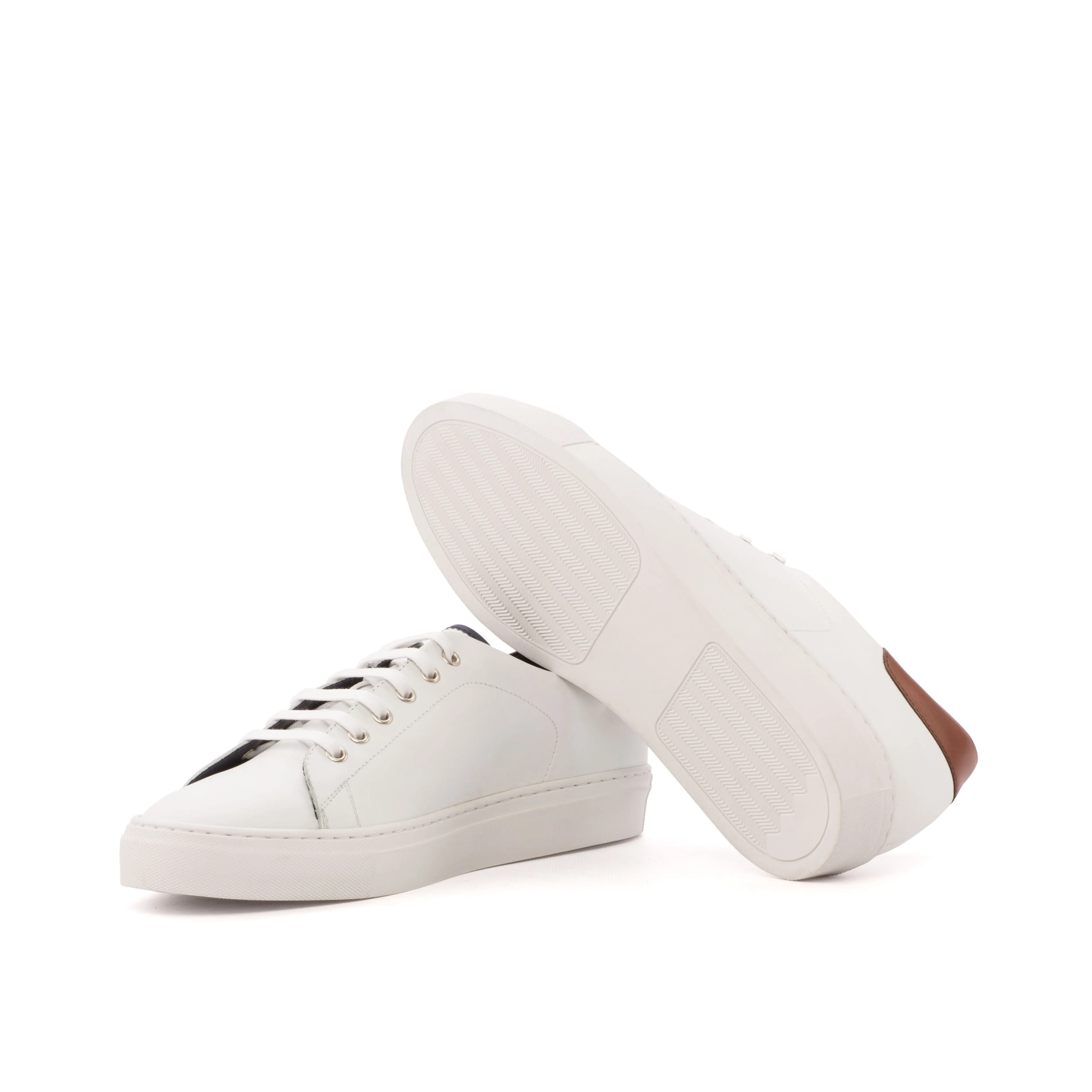 White Nappa Leather Classic Trainers running on a track shoes
