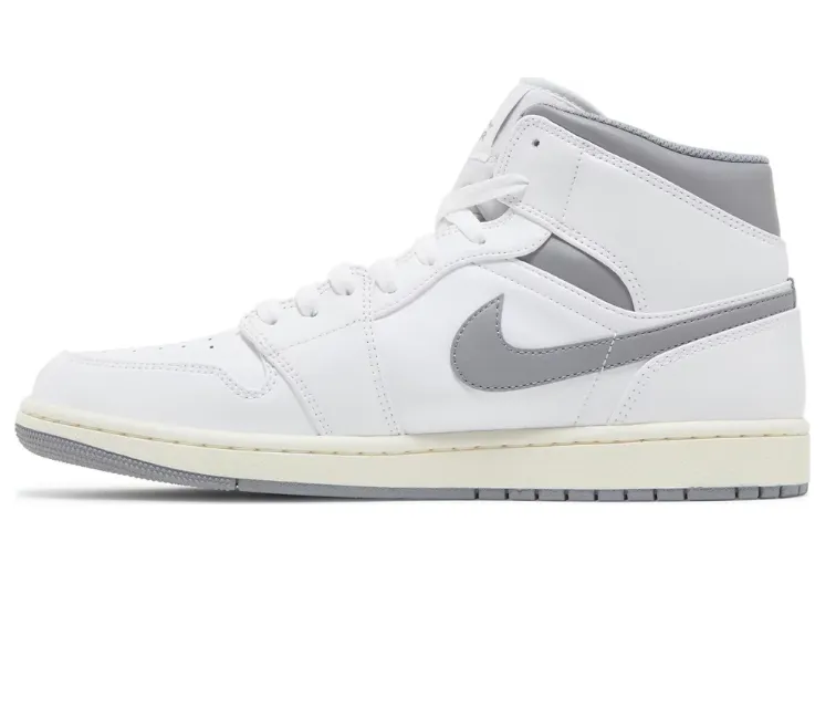 Men's Nike Air Jordan 1 Mid (Vintage Grey) ShockAbsorbingMidsole running with headphones