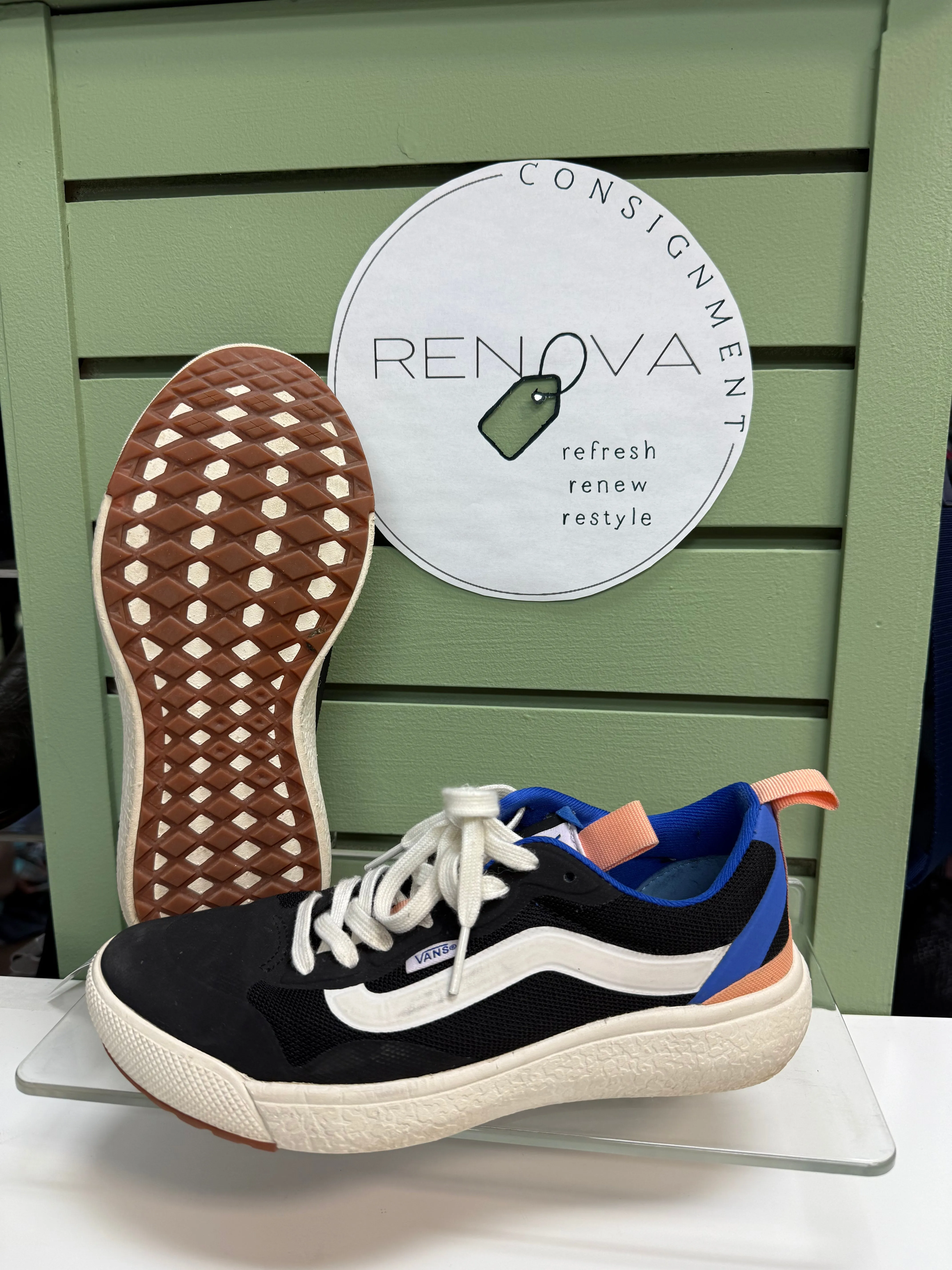 running on an outdoor track shoes Vans Runners (Womens 7)