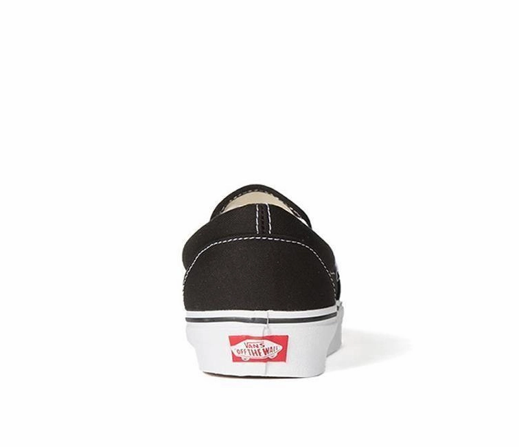 Vans Classic Slip-On (Black/White) running in new tracks shoes running in a roundabout area shoes